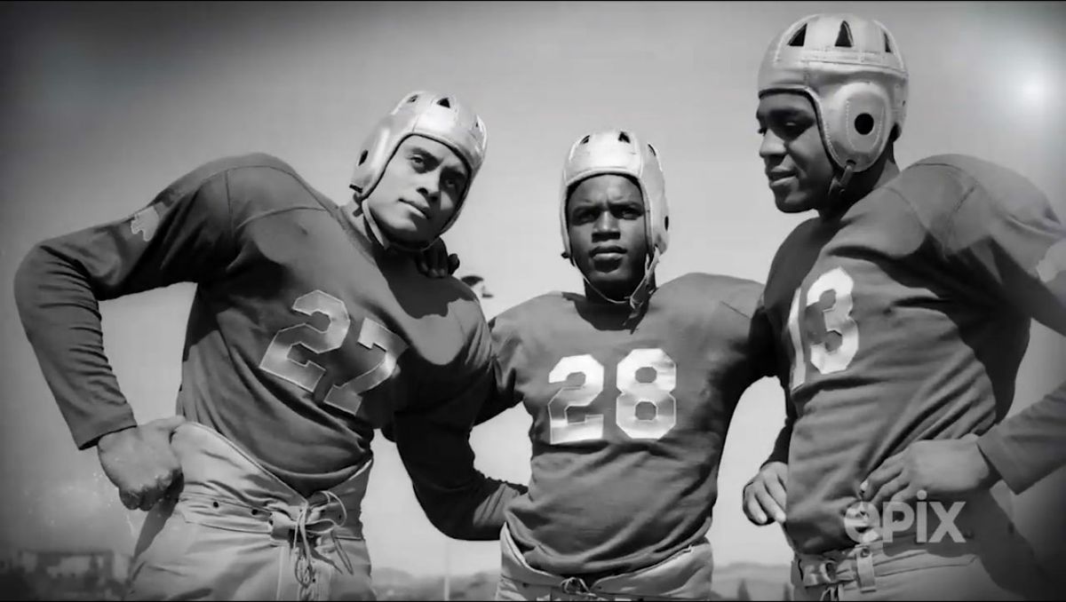 (From left) Woody Strode '39, Jackie Robinson, Kenny Washington '41